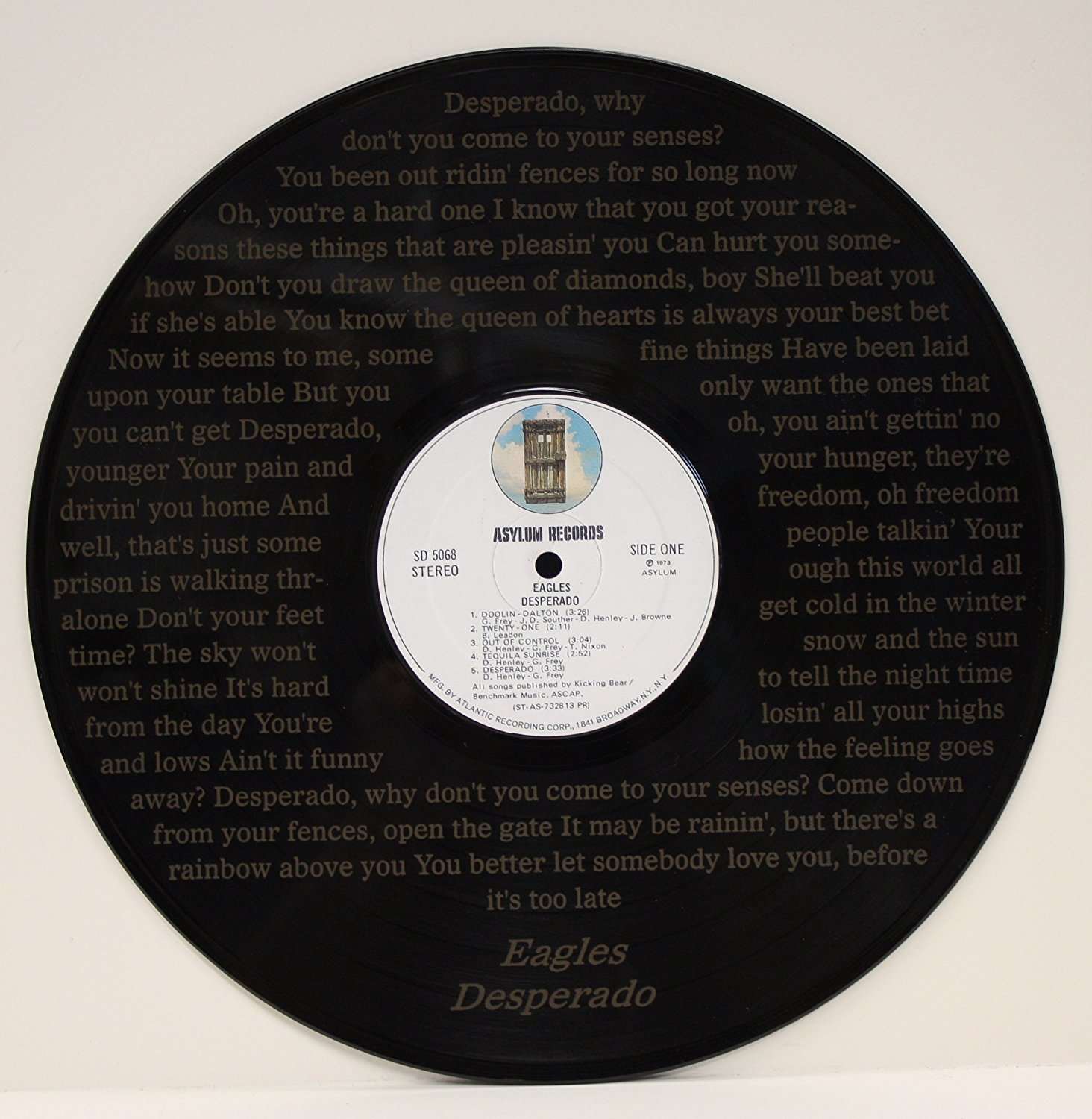 https://goldrecordoutlet.com/wp-content/uploads/imported/Eagles-Desperado-Black-Vinyl-12-LP-With-The-Words-To-The-Hit-Song-Laser-Etched-Into-The-Record-Unique-Wall-Hanging-B00G1VE4VI.jpg